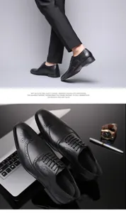 Classic black leather Brogue dress shoes with elegant wingtip perforated details