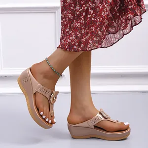 Champagne gold wedge thong sandals with elegant hollow design and B logo buckle