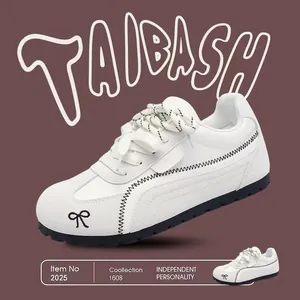 Eleganti scarpe da ginnastica tedesche bianche stile coreano da donna con fiocco