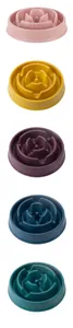 Close-up view of pet slow feeder bowls in five colors: pink, yellow, purple, blue, and green