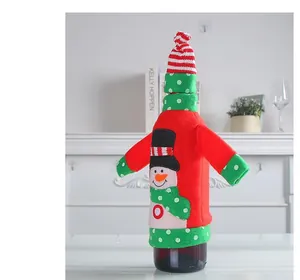 Festive snowman wine bottle cover with red knitted hat and green polka dot scarf details