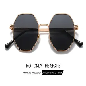 Fashionable hexagonal sunglasses with gold metal frame and dark lenses for men and women