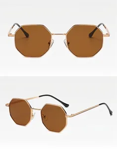 Detailed close-up views of vintage polygonal gold metal frame sunglasses with brown lenses