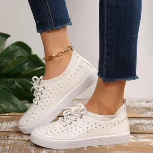 Stylish white microfiber sneakers with breathable hollow design for summer leisure.