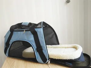 Detail view of a breathable blue pet carrier bag featuring a soft white plush interior mat