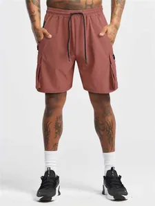 Men's quick-dry cargo shorts with 4-way stretch and drawstring waist in brick red color