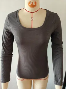 Detail view of women's gray ribbed U-neck long sleeve T-shirt with slim fit texture
