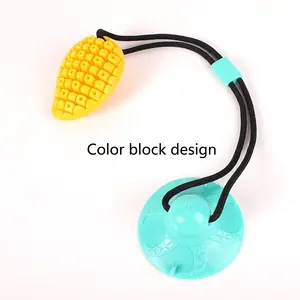 Durable mango-shaped suction cup dog pull toy for aggressive chewers and teeth cleaning
