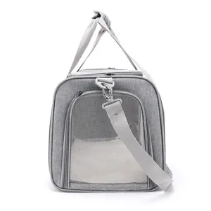 Grey breathable pet carrier bag with mesh windows and adjustable shoulder strap