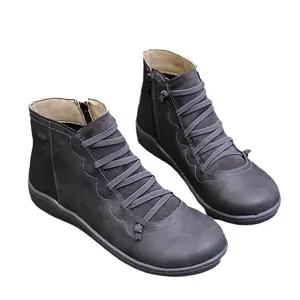 Retro charcoal grey women's ankle boots featuring elastic laces and side zipper