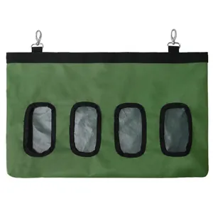 Durable green hanging rabbit hay feeder bag with 4 holes for guinea pigs and hamsters