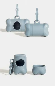 Detailed view of disassembled bone-shaped pet waste bag dispenser in blue.