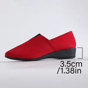 Detail view showing the 3.5cm wedge heel height of the red suede slip-on shoe for women.