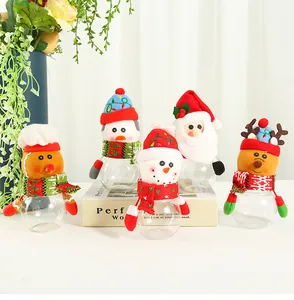 Detail view showing a group of assorted Christmas themed transparent candy jars with plush characters