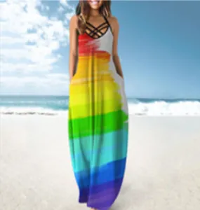 Detailed view of a rainbow print maxi dress featuring criss-cross straps and pockets.