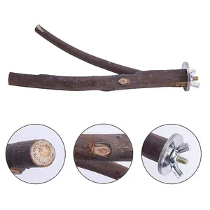 Detail view of natural wood bird perch branch featuring secure metal mounting hardware
