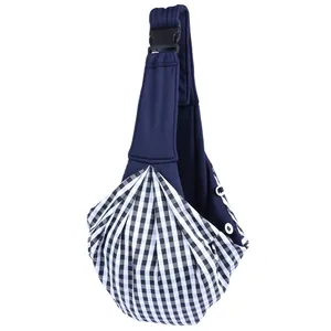 Detail view of adjustable pet sling carrier for small dogs with navy blue gingham design