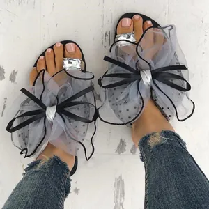 Tongs Plates à Bague d'Orteil pour Femmes Nœud en Maille Surdimensionné Décoration en Strass Sandales de Plage Décontractées Semelle en Caoutchouc