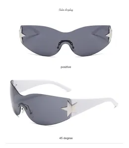 Detail view of white frame wrap-around sunglasses with metallic star accents and gray lenses
