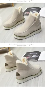 Detailed view of beige warm winter snow boots featuring thick soles and cozy faux fur lining