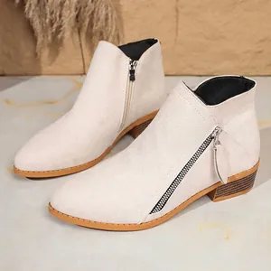 Elegant off-white women ankle boots with chunky heel and double zippers.