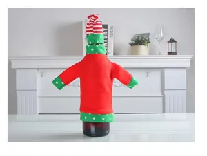 Red and green elf-themed Christmas wine bottle cover with a striped hat accessory