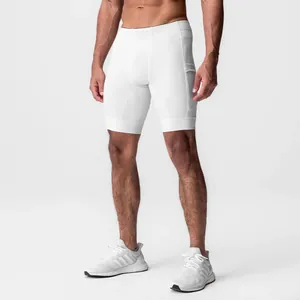 Detail shot showing the texture and side pocket of white quick-dry compression shorts