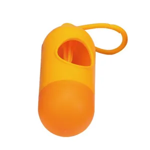 Vibrant orange capsule-shaped dog poop bag dispenser featuring a portable hanging clip