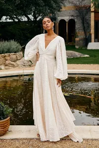 Elegant long-sleeve jacquard pleated maxi dress with lantern sleeves
