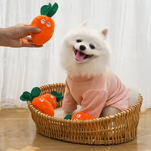 Adorable plush carrot squeaky toy for dogs and cats shown in a cozy pet lifestyle scene
