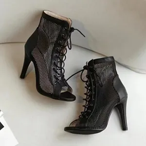 Detailed view of black lace-up mesh peep-toe stiletto high heel sandals for women.
