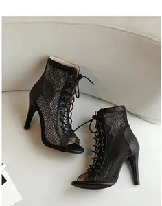 Detailed side view of black mesh lace-up peep-toe stiletto high heel ankle boots
