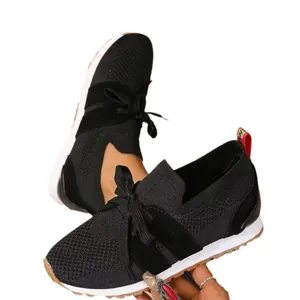 Breathable black mesh women's casual sneakers featuring wedge sole and bow detail