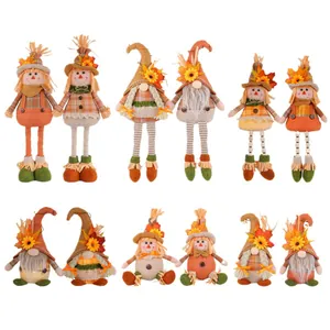 Harvest Thanksgiving scarecrow and gnome doll collection with maple leaves and hats