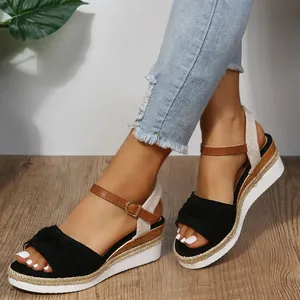 Sandali con zeppa da donna con cinturini a fiocco nero e suole in corda intrecciata