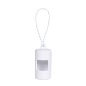 Professional macro shot of a white silicone dog poop bag dispenser with a hanging strap
