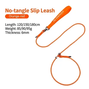 Detail view of orange P-chain dog leash showing rope length, weight, and thickness