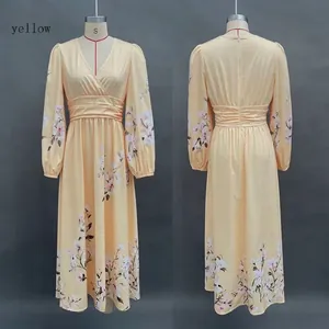 Detailed front and back view of a yellow floral long sleeve V-neck pleated maxi dress for women