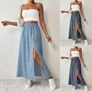 Side view showing the slit detail and various color options for the floral maxi skirt.