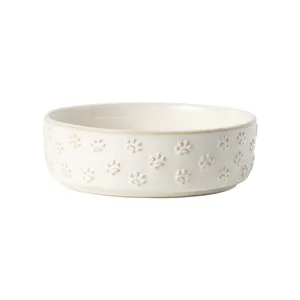 Elegante cuenco de cerámica crema con huellas de patas en relieve para gatos y perros