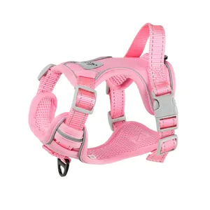Side view of a pink breathable mesh dog harness with reflective straps and top handle.