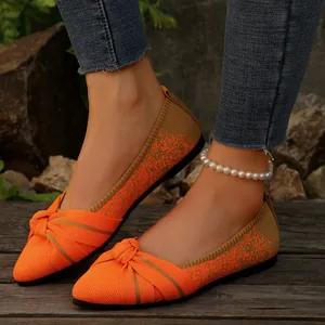 Stylish orange knitted women's flats with pointed toe and bow detail decoration