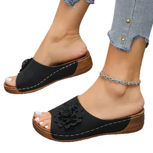 Women's black floral wedge peep-toe sandals with a stylish and comfortable sole