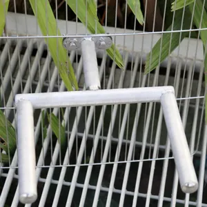 Close-up of a stainless steel bird perch with textured surface for parrot claw grinding