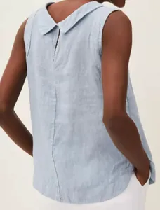 Back view of light blue sleeveless cotton linen top with small collar and curved hem