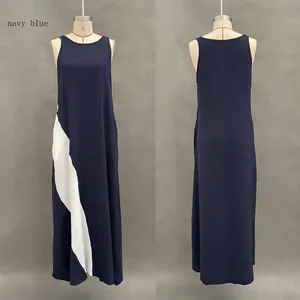 Front and back view of a sleeveless navy blue color-block maxi dress on a mannequin