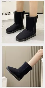 Side view and detail of classic black high-top snow boots with soft suede finish