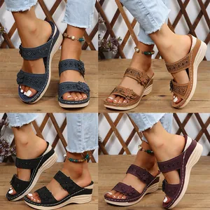 Close-up display of women's vintage floral wedge sandals in four stylish colors