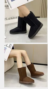 Detailed view of women's mid-calf suede snow boots in classic black and brown colors