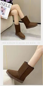 Detailed view of classic brown high-top snow boots for women in a cozy winter setting